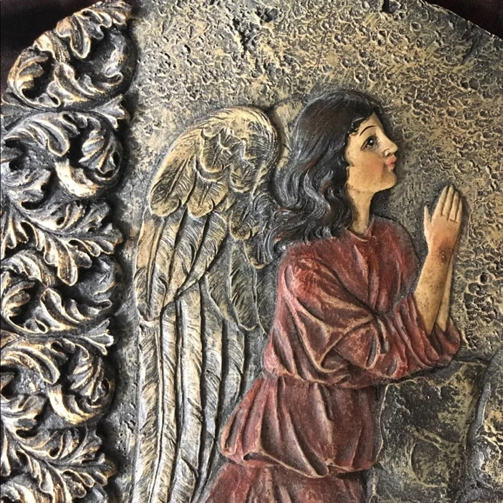 Faith pottery angel sculpture